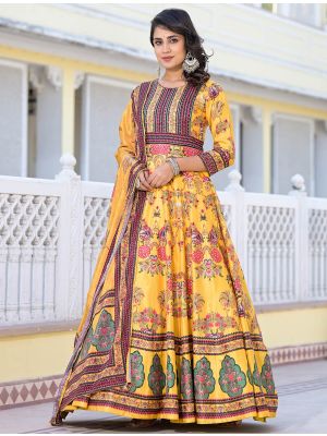 deep yellow dola silk premium gown with dupatta fabgo20306