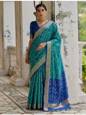 Teal Raw Silk Blend Saree With Ikat Weaving