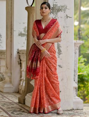 Light Red Raw Silk Blend Saree With Ikat Weaving